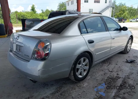 2002 Nissan Altima 2.5 Sl from USA, damaged, VIN 1N4AL11E92C124478